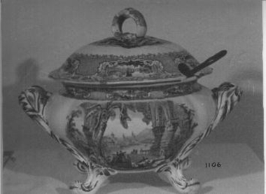 Large china tureen on four legs