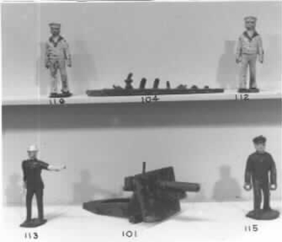 Toy soldier painted blue with red tie.