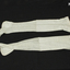 A pair of machine knitted white lace stockings of the Victorian era between 1850 -1880. 
