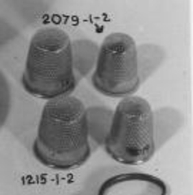 Two silver plated thimbles