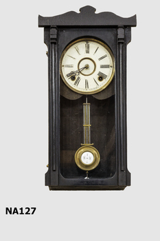 Dark wooden mantel clock 