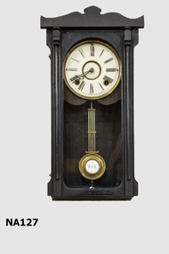Dark wooden mantel clock 