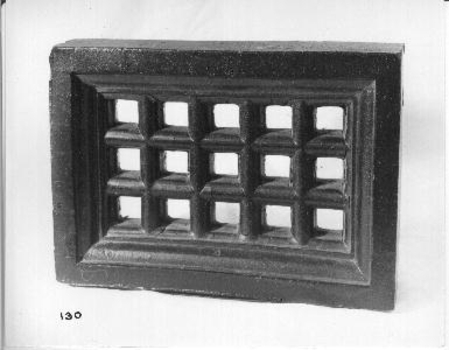 Dark glazed and fired terracotta ventilation brick 