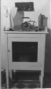  Cream painted wooden meat safe on four legs. 
