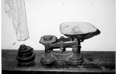 Set of scales with container for ingredients.
