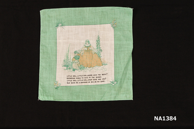 Child's cotton handkerchief with green border.