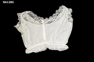 Fine white cotton camisole with crochet cotton lace at neck and sleeves.