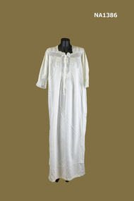 White cotton Nightdress with square neckline and long sleeves. 
