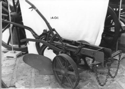 Horse drawn one way plough with one share - mould board; two discs, one fluted. 