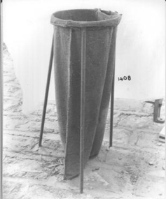 Bag Holder for bags being filled with wheat or other grains. 
