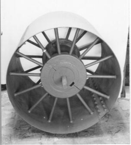 Part of a larger piece of machinery used to crush clay. 