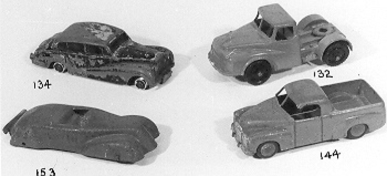 Red painted metal model of Utility truck. 