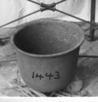 A caste iron insert for 'copper'.