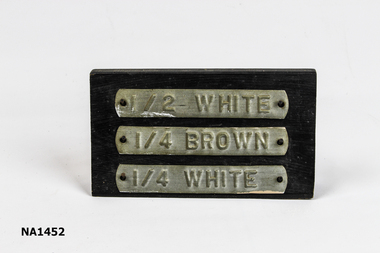 Wooden free standing sign with 6 nails to support 3 embossed metal tags
