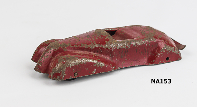 Red painted metal sports car.
