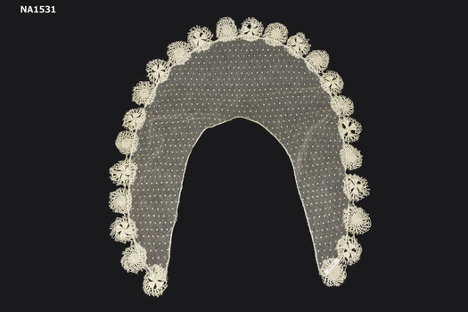 Cream collar made of fine spotted mesh with edging of crochet medallions.