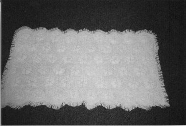 Cream cotton quilt made up in 56 sections 