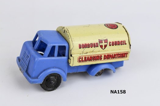 Blue synthetic truck with yellow painted metal 