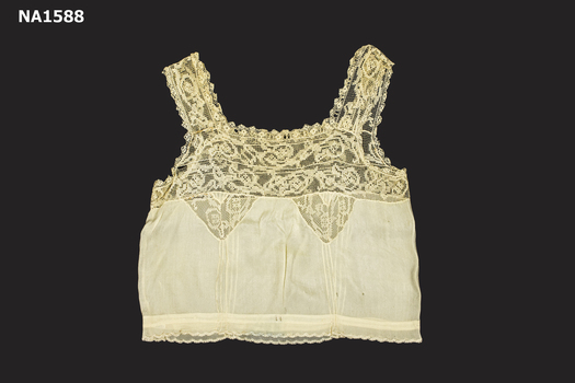 Cream silk camisole with square neckline.