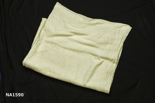 White cotton woven bed quilt