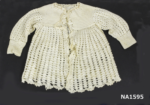 Cream wool crochet matinee jacket. 