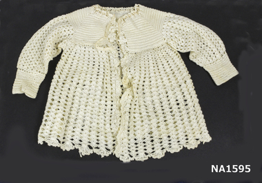 Cream wool crochet matinee jacket. 