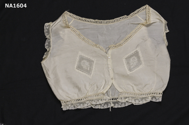 Cream Fuji silk camisole with diamond lace insets at front. 