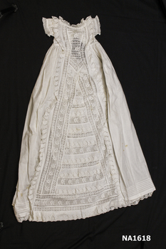 White cotton christening gown with short sleeves. 