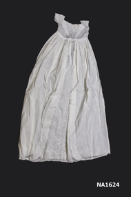 White cotton christening gown with short cap sleeves. 