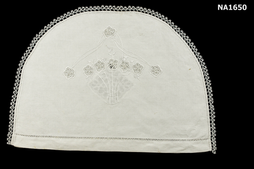  White teapot cover- semi-circle in shape and doubled. 