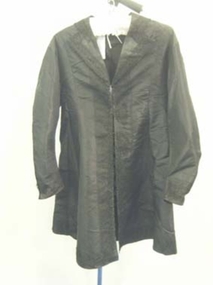 1860 Black silk taffeta coat with long sleeves.
