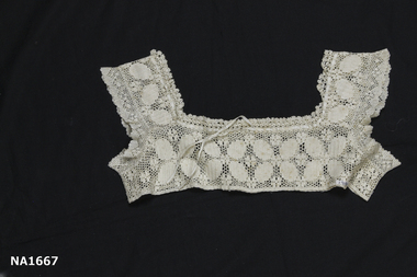 Square neck cream crochet yoke. 