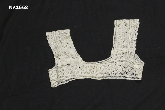 White fine cotton knitted yoke.