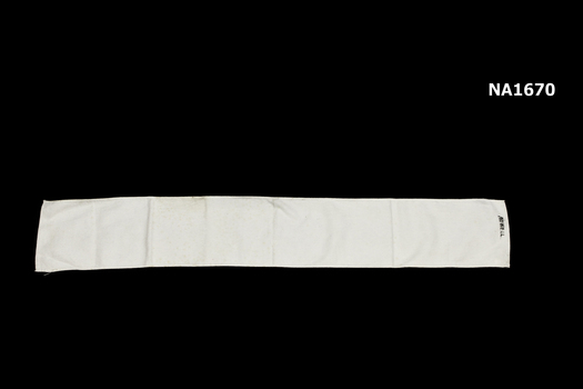 White flannel length used to bind baby's stomach after birth so that the navel would not stick out.
