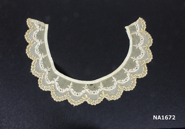 Cream georgette embroidered collar. 