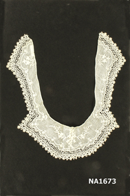 White lawn collar with embroidery and crochet edging.