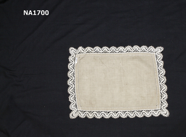Ecru coloured linen tray cloth with cream machined cotton lace edging.