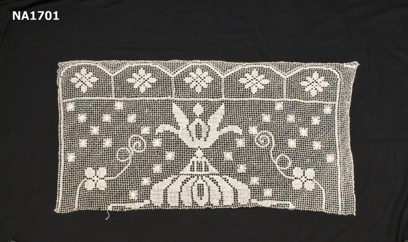 Cream cotton machined crochet tray cloth with one edge missing