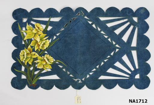 Rectangular blue suede table centre with scalloped edge