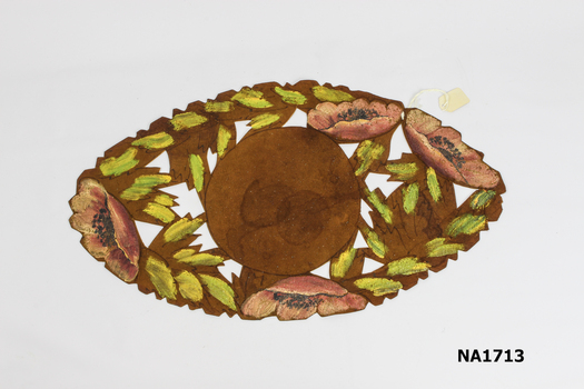 Brown suede oval centre piece for table.