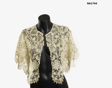 Large cream lace collar/cape.