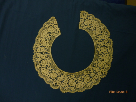 White cotton lace collar.