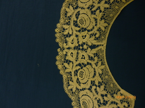 White cotton lace collar.