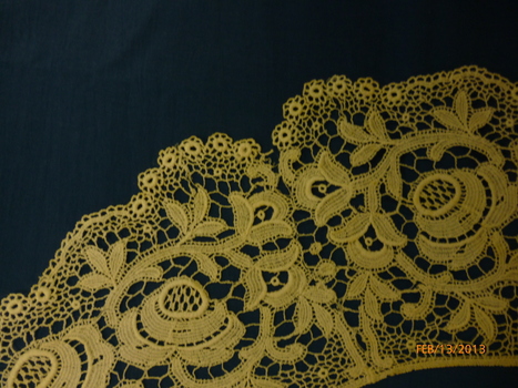 White cotton lace collar.