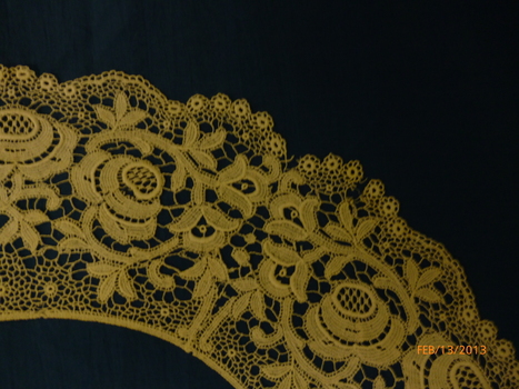 White cotton lace collar.