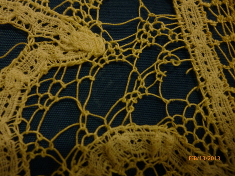 White cotton lace collar.