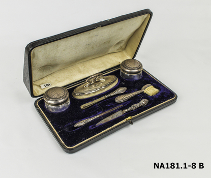 Two jars with lids and a bow pattern.