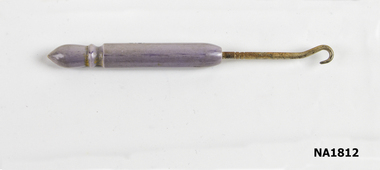 Button hook for buttons on shoes.