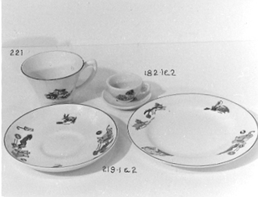 White porcelain toy cup and saucer. 
