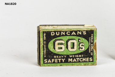 Matchbox with green and black lid